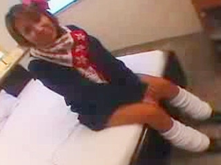 Get ready for a naughty adventure with a horny Tokyo babe with nipple clamps and 'XXX' action!